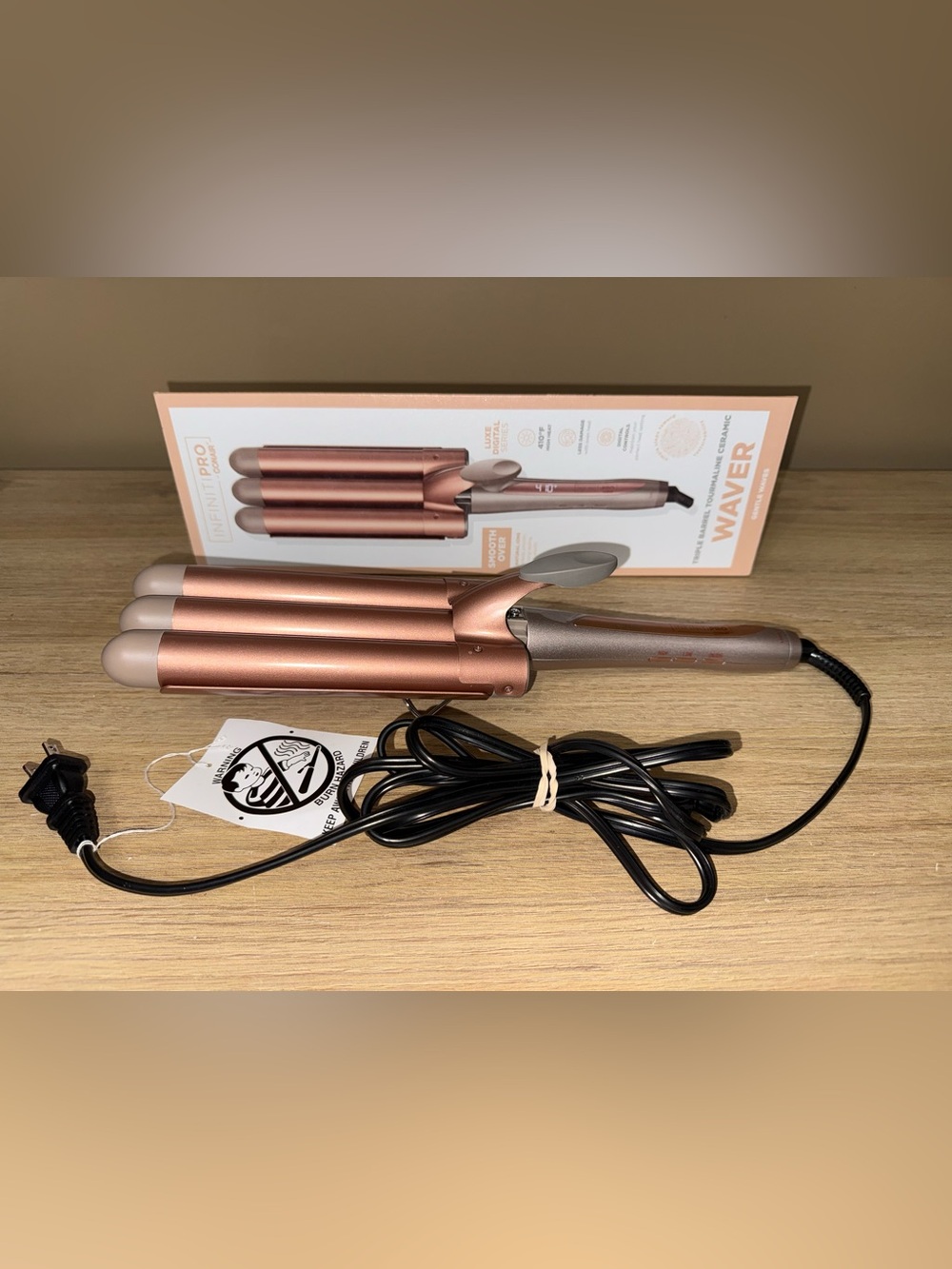 INFINITE PRO 3-Bar Waver tourmaline ceramic curling iron.